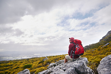 Image showing Man, hiker and gear with backpack, landscape and travel for nature, adventure and hiking. Male person, journey and backpacking for discovery, fitness and exploring for recreation, outdoor and sports