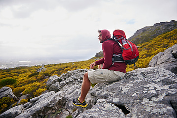 Image showing Man, mountains and view with thinking outdoor, travel and hiking for fitness and fresh air with backpacking. Calm, peace and wellness in nature, trekking and adventure for exploring with mindfulness