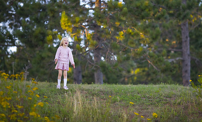 Image showing Girl Singing After Climbing a Hill