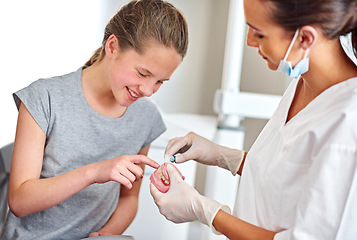 Image showing Female doctor, child and advice for teeth brushing with oral hygiene, healthcare and toothbrush. Dentist, dental care and educating for checkup with orthodontist for tooth health, cavity prevention