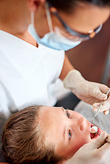 Image showing Mirror, dentist and woman with child for exam, healthcare or orthodontics for teeth in clinic. Dental hygiene, kid and doctor with tools for patient, oral or cleaning mouth with medical pediatrician