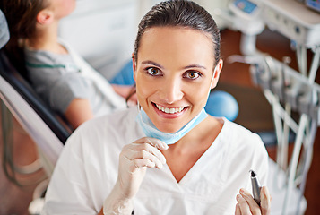 Image showing Female dentist, clinic and tools in portrait with patient for medical consult on oral dental hygiene for healthy teeth. Person, doctor and visit by orthodontist, specialist and mouth for treatment