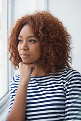 Image showing Creative, thinking and black woman at window in office with ideas for future or development in business. Employee, planning and professional inspiration for progress and solution in workplace