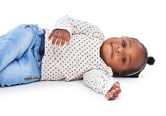 Image showing Portrait, baby or girl to relax, lying or happy on floor of mockup studio on white background. Black toddler, ground or smile to rest, calm or healthy as peace, comfort or morning break in childhood