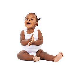 Image showing Infant, black girl and clapping in studio for happiness, growth and playful newborn with white background. Baby, child and toddler for cheerful, excited or childhood development with hands together