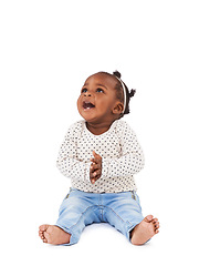 Image showing Baby girl, playing and clapping with smile in studio for applause, fun and cheerful on white background. Child, learning and motor skills for childhood development, excited and happy kid or infant