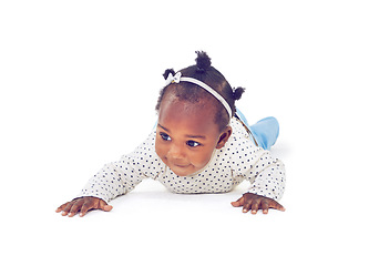 Image showing Baby, girl or crawling on tummy, development or progress of motor skill or balance on studio mockup. Black child, crawl or explore on stomach to learn, steps or mobility milestone on white background