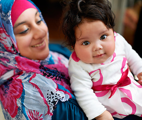 Image showing Happy, portrait and muslim mom with baby in home with love and care for family in Saudi Arabia. Infant, child and Arabic mother relax in house with support and kindness for kid in embrace of mama