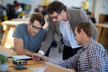 Image showing Business people, discussion and tablet for collaboration on research, problem solving and teamwork. Men, partnership and together for planning in coworking office, brainstorming and conversation