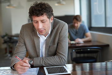 Image showing Tablet, auditor and man with document, writing and report of stock market on desk of workplace. Office, staff and male person working for business, paper and budget of corporate company for economy