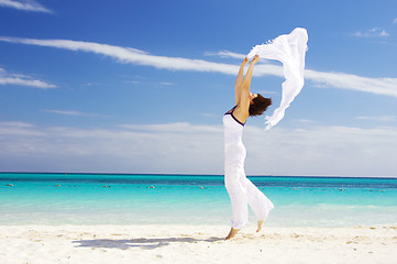 Image showing happy woman with white sarong