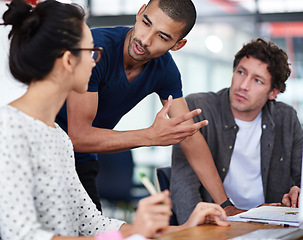 Image showing Teamwork, notebook and meeting in office, workspace or collaboration for brainstorming in creative career. Job, planning and partnership with documents, desk or diversity for professional discussion