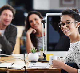 Image showing Portrait, computer and employees in office, workspace or collaboration for working in creative career. Job, notebook and partnership with documents, desk or staff for professional discussion