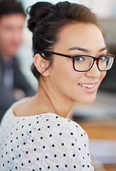 Image showing Happy, portrait and creative woman in office at desk planning a project for company in Singapore. Professional, employee and person with smile for productivity, process or work on development of idea