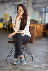 Image showing Business, woman and portrait with smile in modern office for creative internship, confidence, startup pride and glasses. Entrepreneur, employee and happy in a warehouse workspace and relax on chair