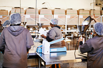 Image showing Worker, warehouse and packaging distribution in factory for coffee manufacturing with collaboration, wholesale or equipment. People, shipping and facility for caffeine beans delivery, bag or storage