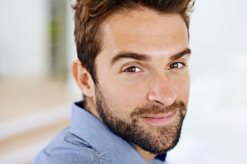 Image showing Smile, headshot and portrait of man in house, home and living room happy to relax for holiday, break and weekend. Male person, gentleman and gen z guy in apartment, bedroom and lounge for vacation