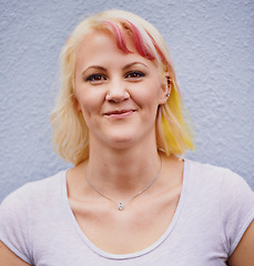 Image showing Woman, portrait and trendy color for hair at salon for edgy haircare, treatment and style for makeover. Female, confident and haircut isolated on grey wall outside with multicolored strands.