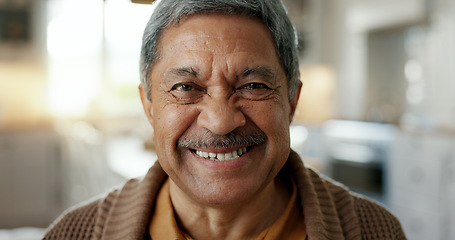 Image showing Happy, face and senior man in retirement, home and laugh in living room with peace, freedom and wellness. Elderly, portrait and person relax with funny, happiness or smile in nursing home and house