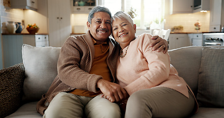 Image showing Senior couple, face and hug on couch, smile and bonding with love, support and relax in retirement in home. Elderly woman, old man and portrait with embrace, together and sitting on living room sofa