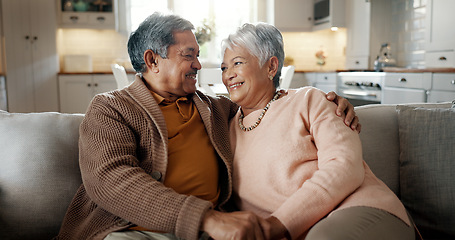 Image showing Senior couple, face and hug on couch, smile and bonding with love, support and relax in retirement in home. Elderly woman, old man and portrait with embrace, together and sitting on living room sofa