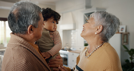 Image showing Smile, love and grandparents with grandchild at their home for bonding in the living room together. Happy, family and senior woman and man from Mexico with a baby, toddler or kid at modern house.