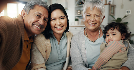 Image showing Happy family, love and selfie in a living room relax, bond and laughing in their home. Portrait, smile and baby with mother and grandparents in a lounge together for profile picture, moment or memory