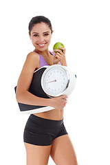 Image showing Portrait, scale and woman with weight loss, apple and healthy person isolated on white studio background. Face, girl and model with wellness, balance or exercise with diet plan, nutrition or benefits