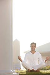 Image showing Portrait, happy or yogi in mindfulness, meditation or zen practice as spiritual, health or temple. Man, smile or pose on grass as balance, holistic or gratitude in hope, wellness or joy on mockup