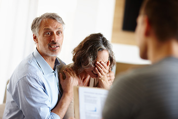 Image showing Mature couple, bad news or stress in home with surprise, crying or sad in meeting with financial advisor. Senior, man and woman with announcement for pension fund fail, bankruptcy and investment debt