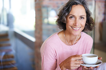 Image showing Mature woman, home and smile with coffee to relax on day off and leisure. Female person, holiday and happy in living room with cup of tea for lunch on break, chill and self care in portrait.