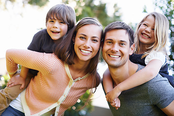 Image showing Portrait, smile and family outdoor in nature for love, bonding and piggyback for siblings together. Face, happy parents and carrying kids at garden for connection with mother, father and children