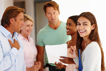 Image showing Group, discussion and happy with paperwork in office for creative startup, teamwork and feedback for staff. Men, woman and business people with smile in professional workplace for review with report