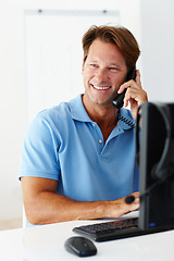 Image showing Happy man and telephone on computer, phone call and conversation for remote work or startup at home. Smile, male person and freelancer or entrepreneur on smartphone for disscussion at house