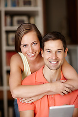 Image showing Couple, portrait and happy in home with tablet for streaming online for movies or films, videos and social media memes. Man, woman and together with hug for bonding or love with affection and support