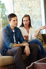 Image showing Couple, argument and fight in home on sofa with stress or angry and sad with disappointment. Relationship, confrontation and disappointed in living room on couch with conflict and emotions.