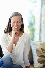 Image showing Woman, portrait and relax on couch for peace, calm and smile for inspiration in living room. Female person, happy and comfortable in lounge on weekend, confidence and pride for ideas or daydream