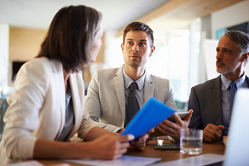 Image showing Serious, consulting or business people in meeting, discussion, conversation in boardroom with CEO. Teamwork, colleagues talking or mature employees planning strategy, feedback report or group project