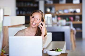 Image showing Woman, laptop and home with phone call in table with conversation and break from remote work as journalist. Female person, laugh and freelancer in living room or lounge with mobile discussion