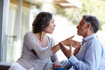 Image showing Divorce, fight and mature couple at home with anger, stress or frustrated by cheating, liar or conflict. Marriage, crisis or aggressive people argue on a patio with doubt, confrontation or disaster