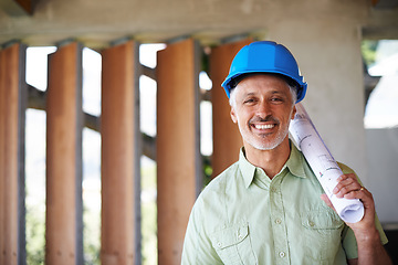 Image showing Architect, floor plan and construction site in portrait for building luxury house, apartment or residence. Man, blueprint and hard hat on for safety, protection or shelter smiling and confident