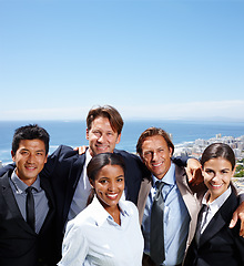 Image showing City, view and business people together for portrait with diversity, happiness and teamwork for career in real estate. Men, women and team for property management, unity and corporate professionals.