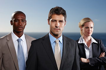 Image showing Portrait, diversity and business people in group for corporate company, outdoor and confidence by ocean. Team, men and woman collaboration with management for executive, workforce and leadership.