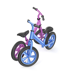 Image showing Blue and pink balance bikes