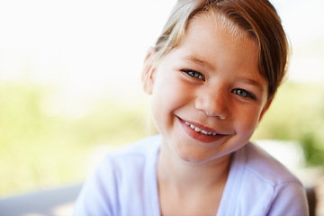 Image showing Girl, child and laugh in portrait at house for development, growth or maturing or holiday. Female kid, smile and family home and relaxed for resting, vacation in peaceful, Montana in America