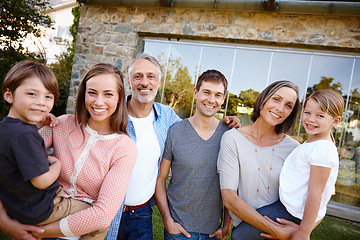 Image showing Portrait, smile and big family outdoor together by home for love and bonding at backyard. Face, parents and happy grandparents with kids at garden for connection with mother, father and children