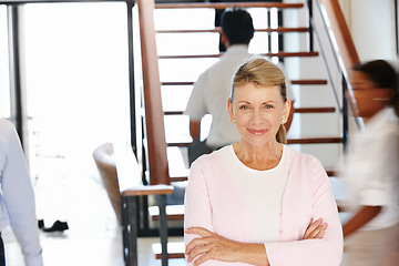 Image showing Woman, CEO and busy office with arms and smile for work, leader or management or senior. Female person, boss and corporate or mature with experience for job, businesswoman or career executive