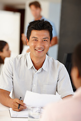 Image showing Documents, Asian man or business people in meeting for report, agenda discussion or portfolio for project. Smile, teamwork or workers planning in office talking, conversation or speaking of paperwork