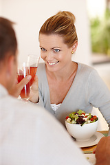 Image showing Smile, woman and salad for eating, nutrition or food at restaurant, cafe and table for date with man. Female person, happiness and girl with vegetables for health, wellness or clean diet with husband