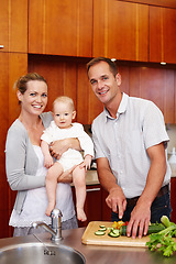 Image showing Family, portrait and cooking in kitchen with baby for bonding with healthy food for child development. Parents, infant and preparation with relationship, love and happy couple in house with salad